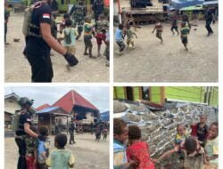 Satgas Yonif 509 Kostrad Berbagi Kecerian Ajak Main Bola Anak Anak Papua