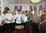 Sukseskan Pilkada, Pj Bupati Bener meriah tandatangani NPHD dengan Dandim dan Kapolres