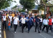 Ribuan Warga Kota Takengon Meriahkan Gerak Jalan Santai HUT Bhayangkara Ke-78