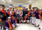 Pj Bupati Sambut Kedatangan 114 Calhaj Agara Di Bandara SIM