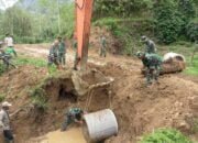 Satgas TMMD Kodim 0106/Ateng Memasang Gorong-Gorong