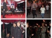 Kapolres Pidie Jaya Pimpin Taptu dan Pawai Obor: Membangkitkan Semangat Patriotisme Jelang HUT RI ke-79