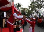 Kirab Api PON XXI Aceh-Sumut Tiba Di Aceh Tengah Ribuan Warga Padati Kota Takengon