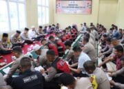 Kapolres Pidie Jaya Pimpin Binrohtal dan Santunan Anak Yatim: Penguatan Spiritualitas dan Empati Sosial Personel Polri