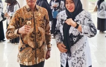 Upacara HUT PGRI di Kota Langsa Tetap Semangat dan Meriah meski Dalam Guyuran Hujan