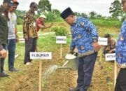 Pj. Bupati Asra Menghadiri Launching Penanaman Perdana Gugus Tugas Polri