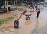 Sinergi Polisi dan Warga: Upaya Preventif Satlantas Polres Pidie Jaya Tangani Genangan Air