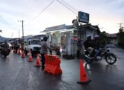 Meski Di Guyur Hujan Polres Aceh Tengah Terus Berikan Pelayanan Bagi Pemudik Dan Pengunjung Wisata