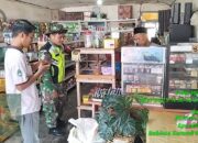 Babinsa Koramil 05/Linge Pantau Harga Bahan Pokok di Pasar Desa Binaan