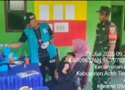 Babinsa Serda Suherman Dampingi Kegiatan Posyandu di Desa Genting Bulen