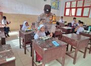 Polsek Muara Dua Kawal Ketat Ribuan Paket Makanan Bergizi untuk Siswa dan Balita