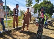 Babinsa Koramil 05/Linge Jalin Komsos dengan Aparatur Desa Despot Linge