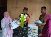Babinsa Koramil 05/Linge Dampingi Pembagian Bantuan Pangan di Kecamatan Linge