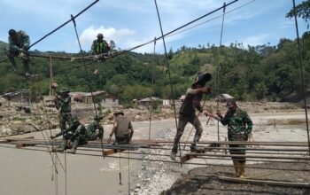 Progres 56,6 Persen, TNI Kebut Pembangunan Jembatan Gantung Desa Burlah