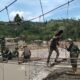 Progres 56,6 Persen, TNI Kebut Pembangunan Jembatan Gantung Desa Burlah