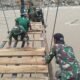 Satgas TNI Kebencanaan Genjot Pembangunan Jembatan Gantung Burlah, Progres Capai 57 Persen