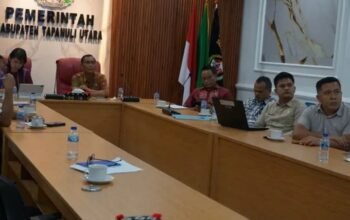 Pemerintah Kabupaten Tapanuli Utara yang diwakili oleh Kepala Dinas Perumahan dan Kawasanl Permukiman Plt.