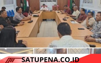 Bupati Tapanuli Utara diwakili oleh Sekretaris Daerah Kabupaten Drs. Henry M. M. Sitompul, M.Si.