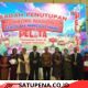 Bupati Tapanuli Utara, Dr. Jonius Taripar Parsaoran Hutabarat, S.Si., M.Si., didampingi Bunda PAUD Kabupaten Tapanuli Utara, Ny. Neny Angelina JTP Hutabarat.