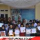 Wali Kota Langsa Serahkan Seragam Sekolah Gratis bagi Anak Yatim Piatu di Langsa Lama