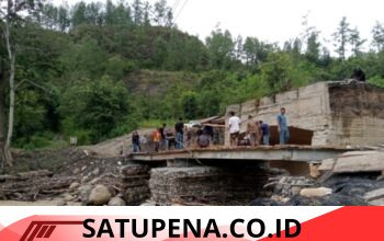 PT.THL Bersama Mitra dan Warga Perbaiki Jembatan Simpil Penarun Kecamatan Linge.