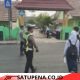Melayani Sepenuh Hati, Personel Polres Lampung Utara Gatur Lalu Lintas dan Bantu Pelajar Menyeberang